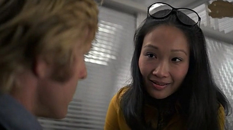 Robert Redford e Tina Chen em Três Dias do Condor