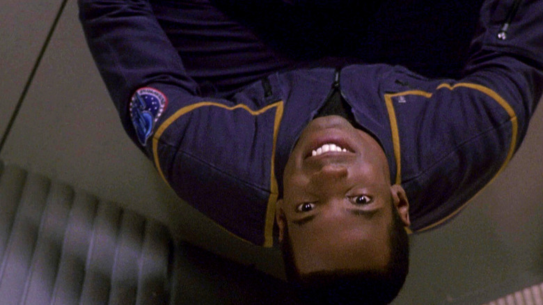 Travis Mayweather sitting on the ceiling on Star Trek: Enterprise