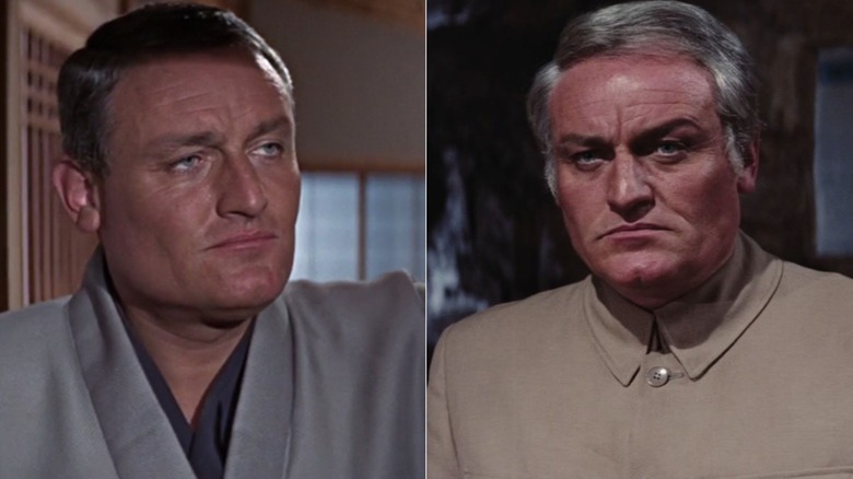 Charles Gray as Dikko Henderson stands in a door in you only live twice, while displaying a threatening look like Blofeld in diamonds are forever