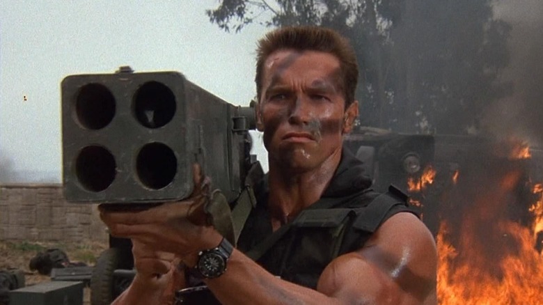 Arnold Schwarzengger firing a rocket launcher in Commando