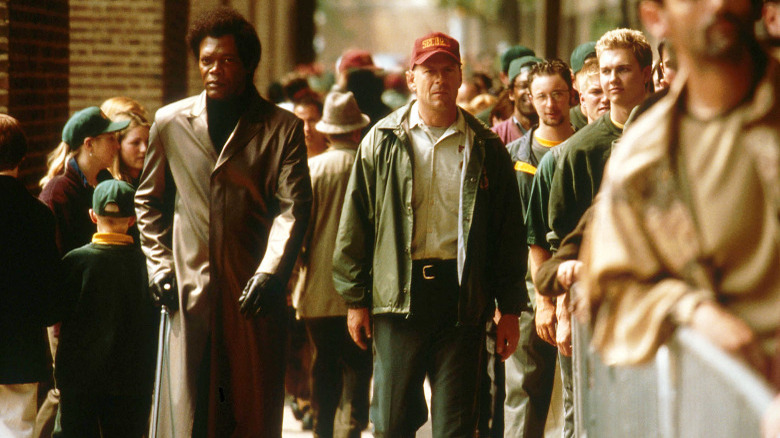 Elijah and David walking together in Unbreakable