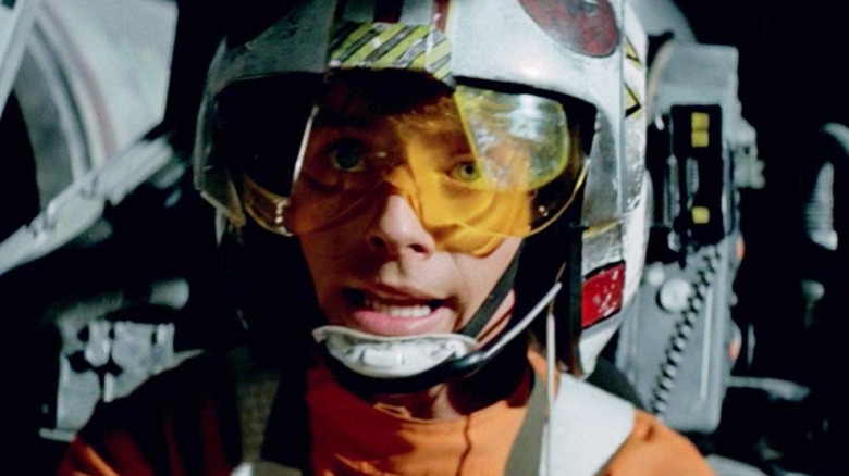 Mark Hamill as Luke Skywalker piloting an X-Wing in Star Wars: A New Hope