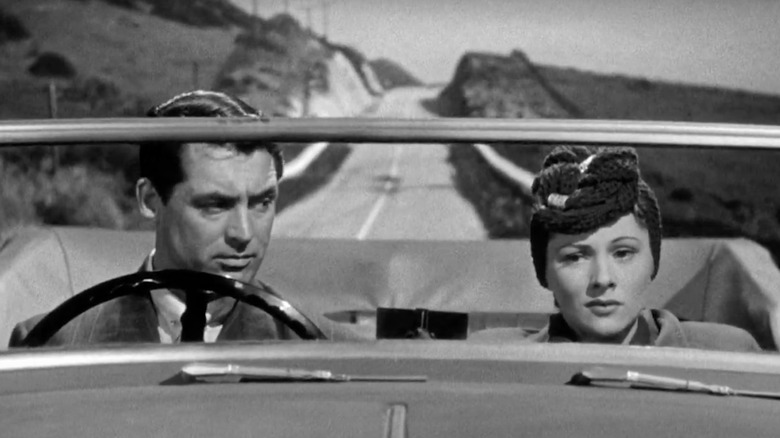 Johnnie and Lina Driving in a Car 