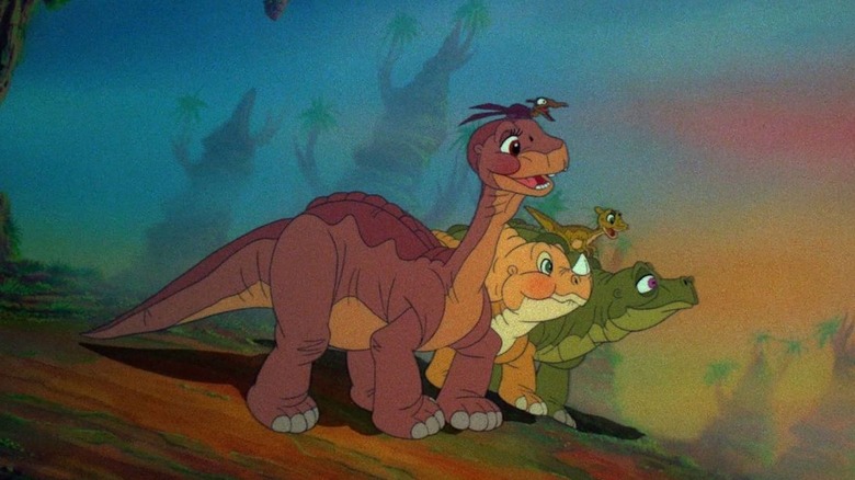 Littlefoot carries treestar, mother leads