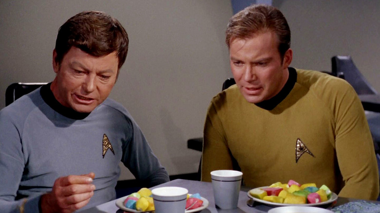 Bones and Kirk eating strange colored food cubes in Star Trek