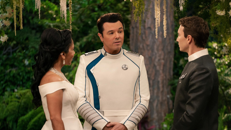 Seth MacFarlane's Ed Mercer officiating the wedding of Penny Johnson Jerald's Claire Finn and Mark Jackson's Isaac on The Orville: New Horizons