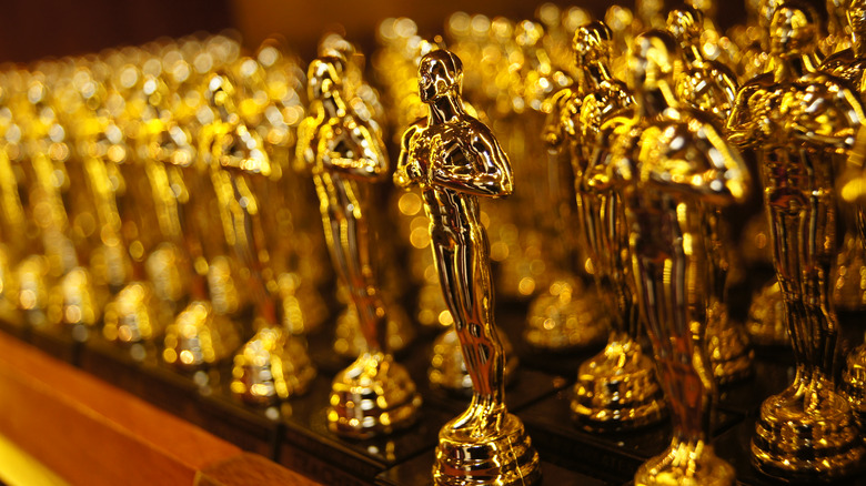 Various Oscars all lined up in rows