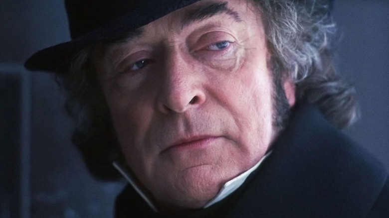 Ebenezer Scrooge glares at someone off-screen in The Muppet Christmas Carol