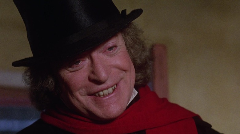 Ebenezer Scrooge smiling in The Muppet Christmas Carol