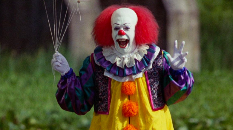 Tim Curry stars in Stephen King's It (1990)