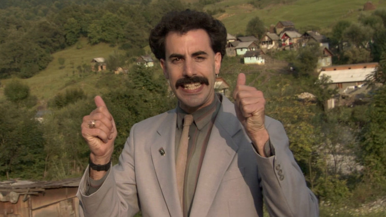 Borat giving two thubs up in Borat! Cultural Learnings of America Make Benefit Glorious Nation of Kazakhstan
