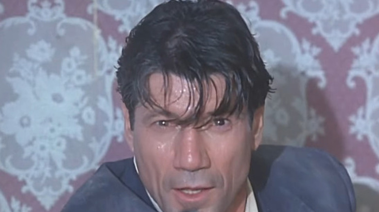 Fred Ward as HP Lovecraft in Cast a Deadly Spell