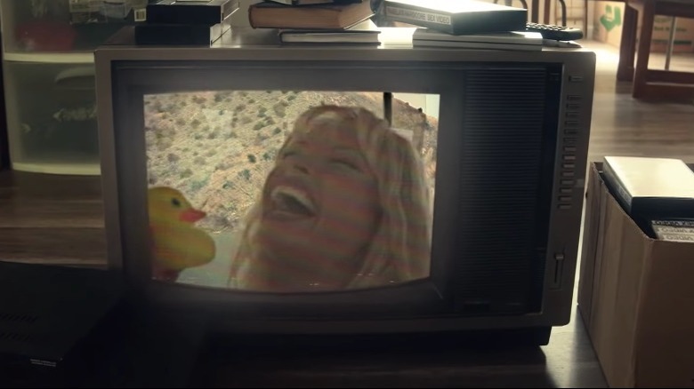 Pam laughing tape on TV