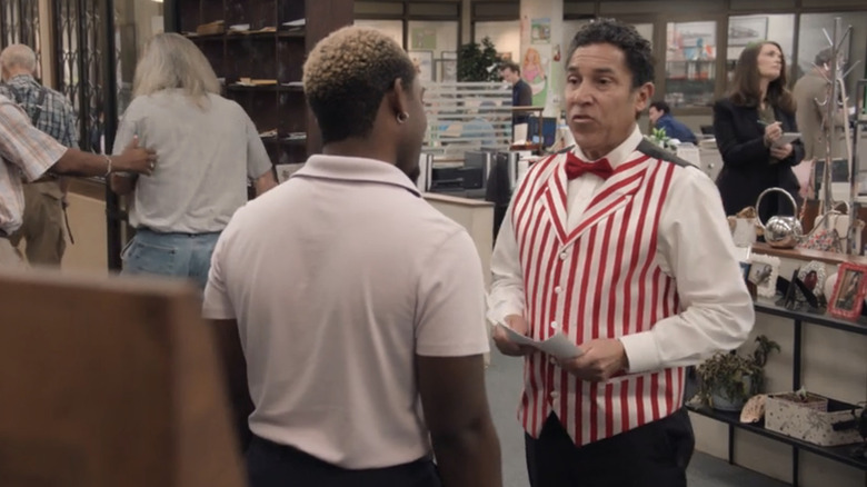 Oscar Martinez (Oscar Nuñez) talks to caretaker Bennett in an office in The Paper Season 2