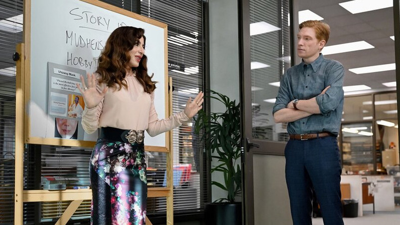 Esmerelda (Sabrina Impacciatore) pitches a story to Ned (Domhnall Gleeson) in The Paper