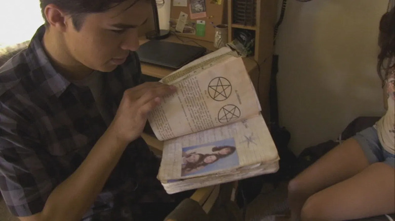 The book reading in Paranormal Activity: The Marked Ones