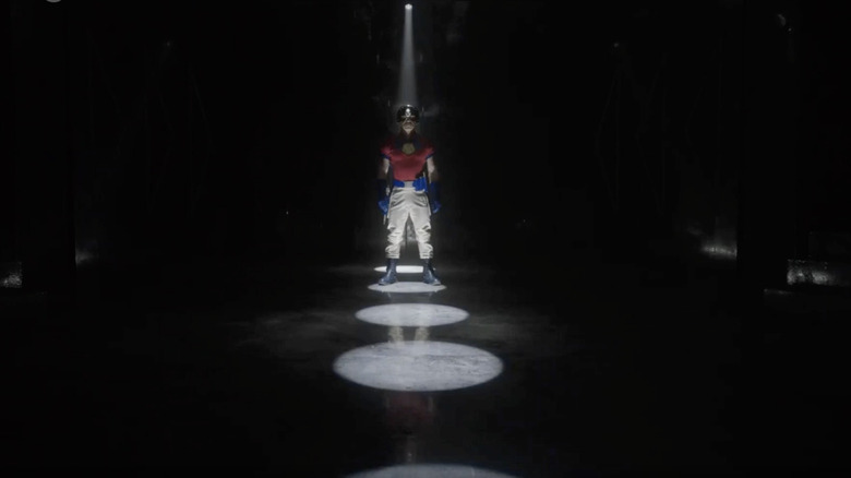 John Cena as Peacemaker preparing for an epic dance number