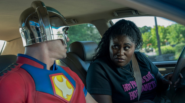 Peacemaker (John Cena) chatting with Danielle Brooks (Leota Adebayo) in Peacemaker season 2