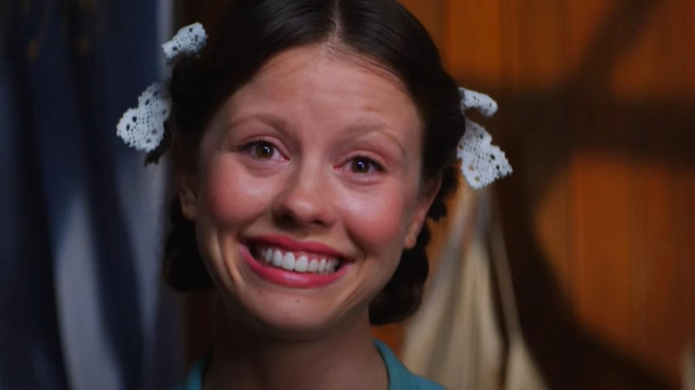Mia Goth smiling in Pearl