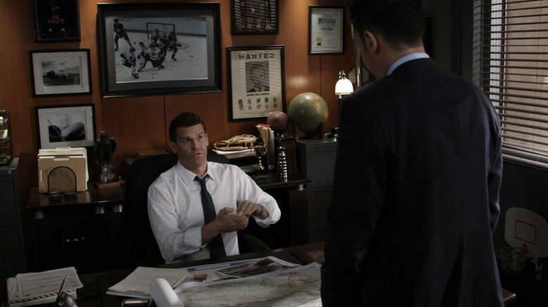Bath David Burinaz Selly sits on his office chair looking for someone in the bones