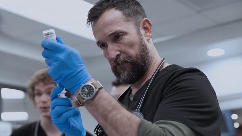 Robby filling a syringe on The Pitt