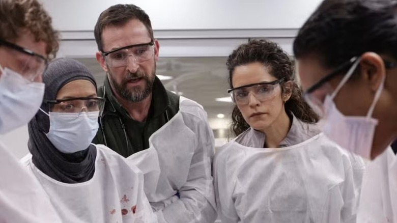 Robby and Al-Hashimi overseeing a procedure on 