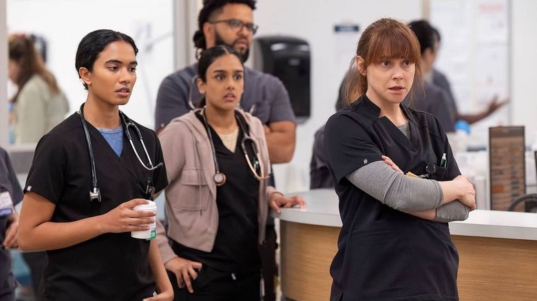 Mohan, Javadi, and Cassie looking alarmed in the ER on The Pitt
