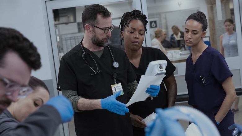 Robby Parker and Garcia looking at a test result on The Pitt