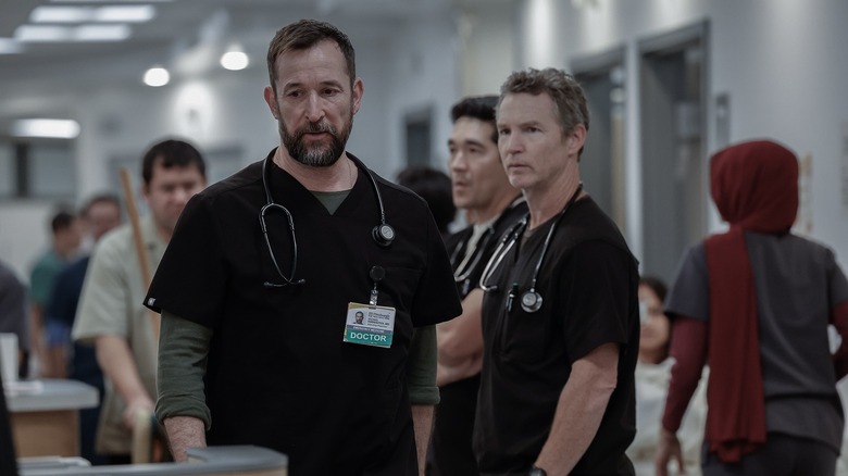 Robby and Abbot looking tired in the hallway on The Pitt