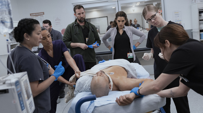 Dr. Robby and the staff of The Pitt work on a patient on The Pitt season 2