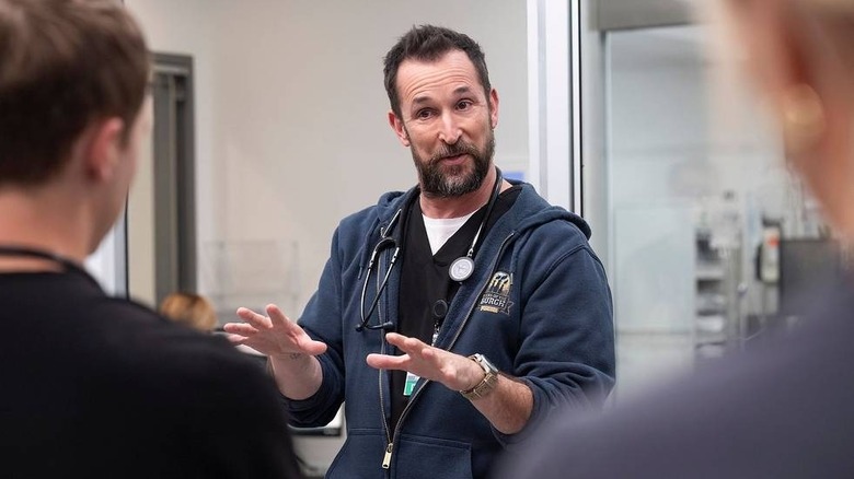 Robby talking to his colleagues on The Pitt