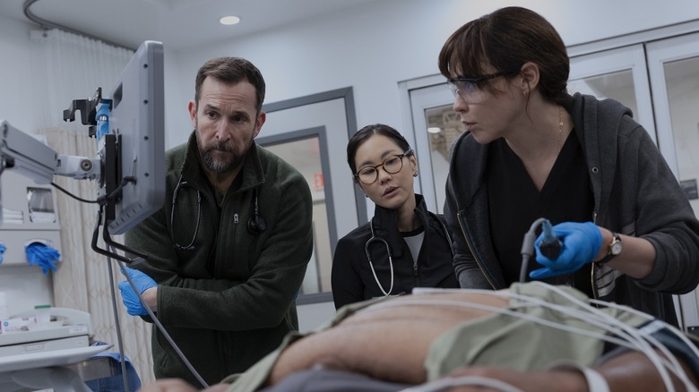 Dr. Robby, Joy, and Cassie treating a patient on The Pitt season 2