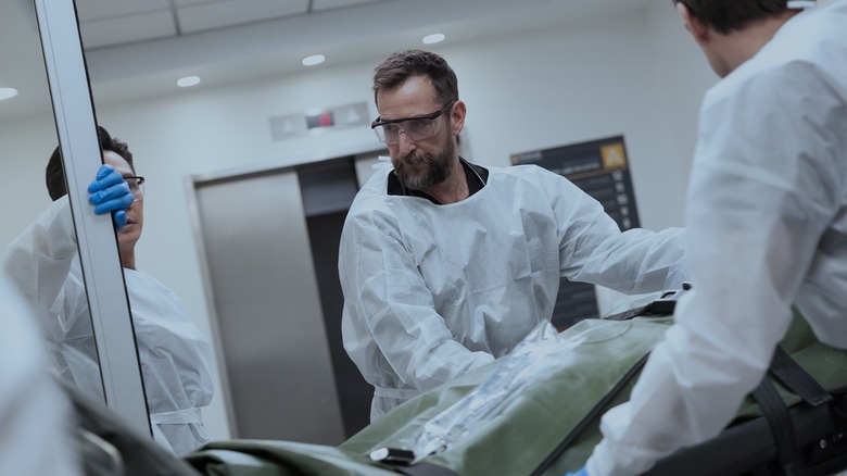 Robby working on a patient on The Pitt