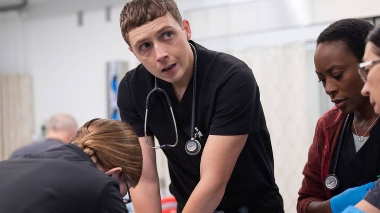Whitaker performing CPR on a patient on The Pitt
