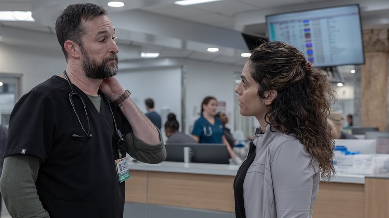 Dr. Robby and Dr. Al-Hashimi standing face to face in The Pitt season 2