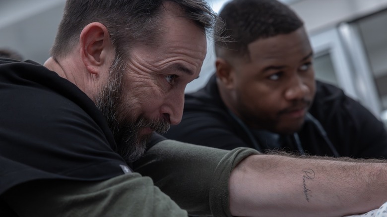 Dr. Henderson and Dr. Robby operating on a patient in The Pitt season 2