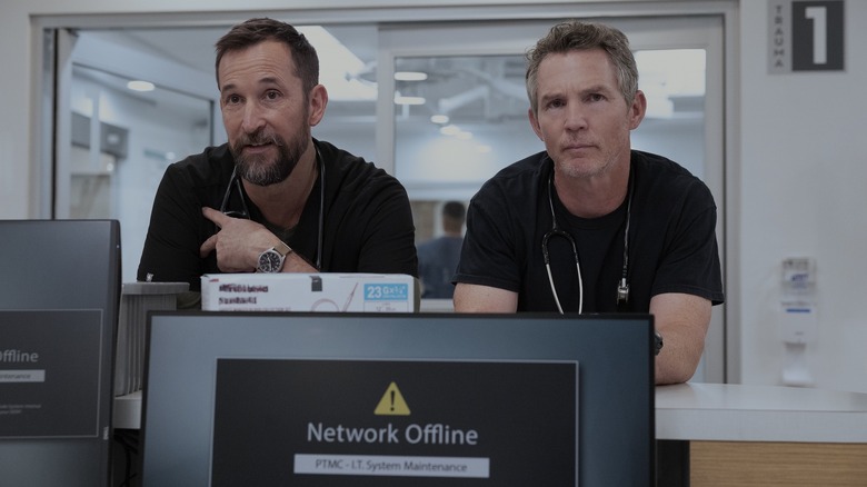 Dr. Robby and Dr. Abbot standing side by side in The Pitt season 2