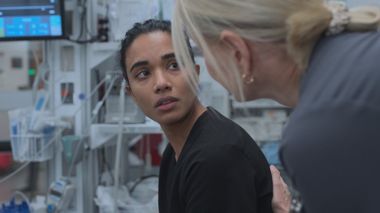 Samira looking at Dana worried on The Pitt