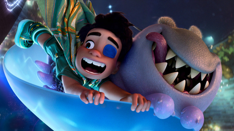 Elio (Yonas Kibreab) and Glordon (Remy Edgerly) flying on a platform in Elio