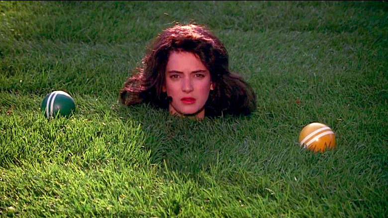 Veronica's Head Sticks Out of the Ground with Croquet Balls