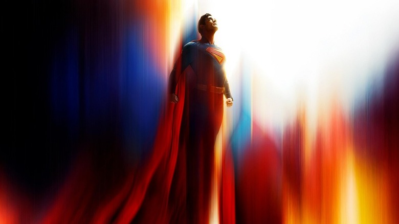 Superman (2025) poster with Superman flying