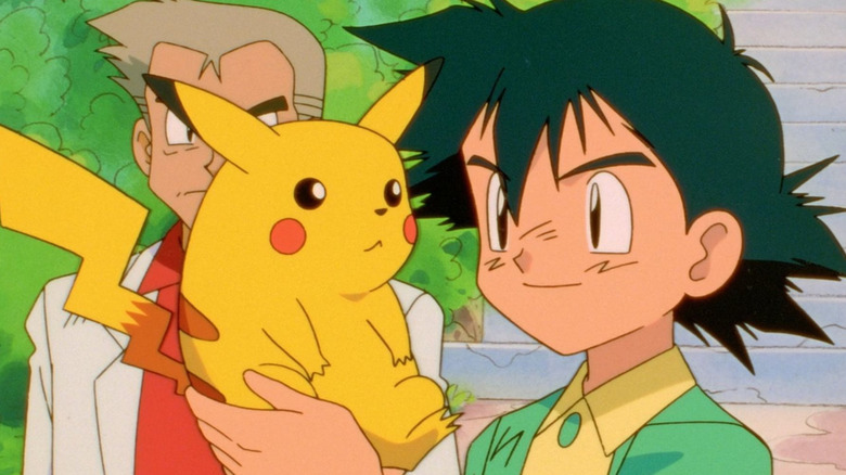 Ash holding a ikachu for the first time, Dr. Oak stands behind him. A scene from Pokémon.