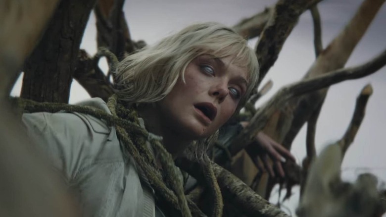 Elle Fanning as an android restarting in Predator: Badlands