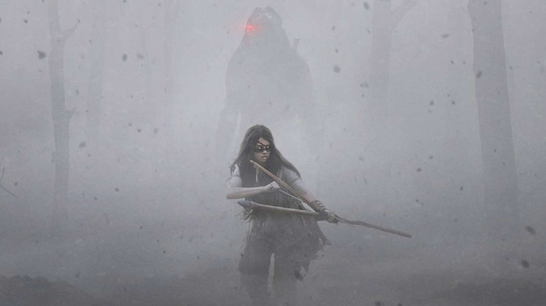 Naru holding a weapon in Prey