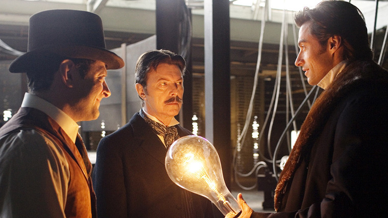 David Bowie, Christian Bale, and Andy Serkis convene around a large light bulb
