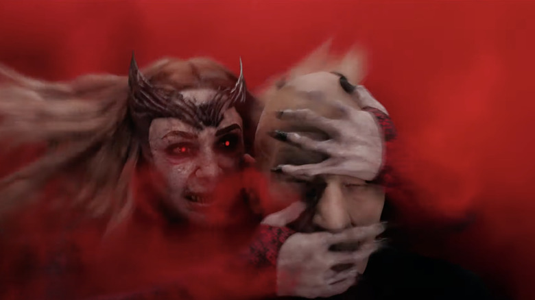 Scarlet Witch snapping Professor X's neck in Doctor Strange in the Multiverse of Madness