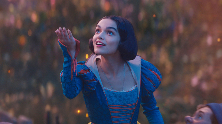 Snow White extending her hand in Snow White
