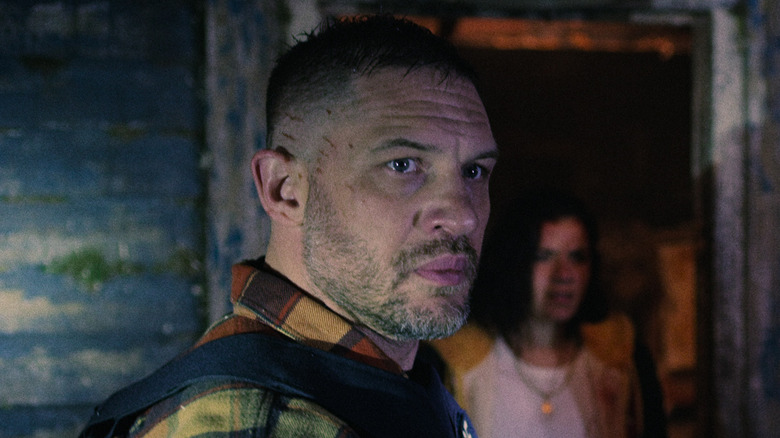 Tom Hardy as Patrick Walker looking intense in Havoc