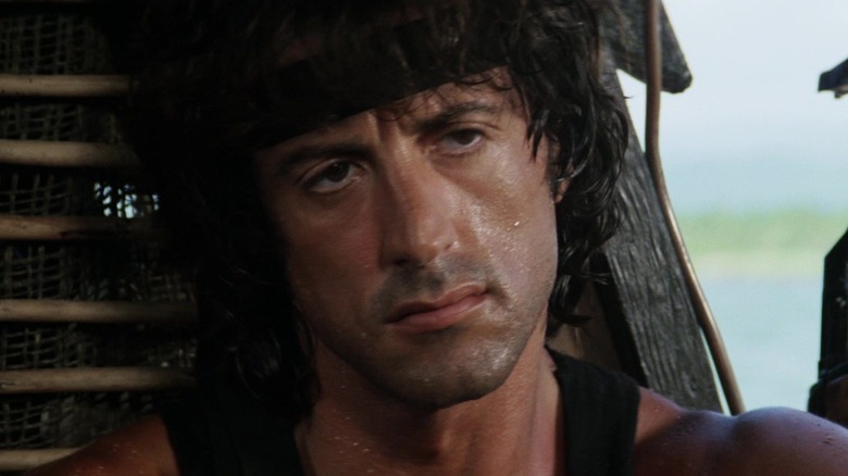 John Rambo looking skeptical in Rambo: First Blood Part II