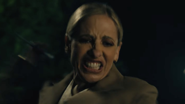 Sarah Michelle Gellar as Ursula getting ready to stab Grace in Ready or Not 2: Here I Come